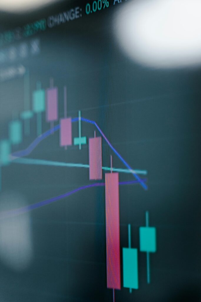 Stock market illustration on screen showing financial data © Photo by Tima Miroshnichenko: https://www.pexels.com/photo/stock-market-illustration-on-the-screen-7567223/